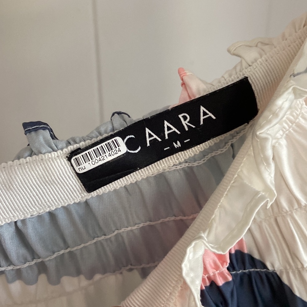 CAARA Sensie Pleated Midi Skirt - Picture 6 of 6